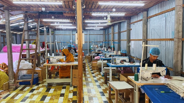 Artisans using sewing machines to handcraft jute pet mats